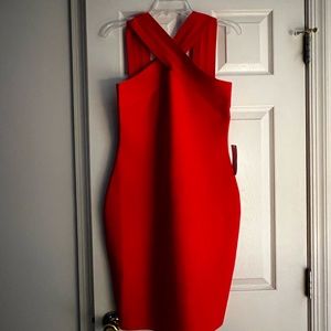 Cross Neck Bandage dress.  Ample stretch and a back zipper.  Fits like a glove